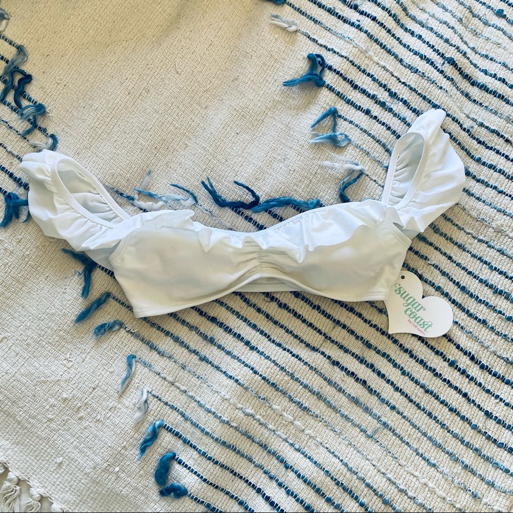 Brand new off the should white bikini top! Tags still on!